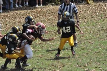 Julius playing youth football in a game